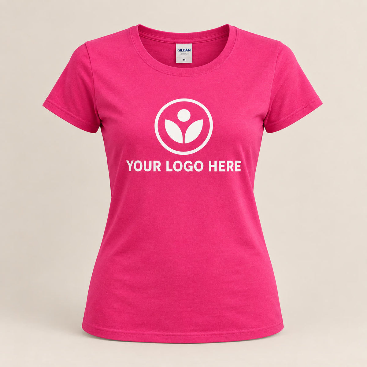 Custom women's softstyle t-shirt in heliconia pink with a YOUR LOGO HERE placeholder print